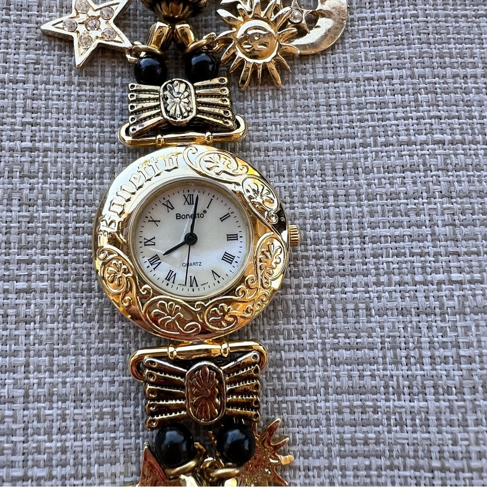Women's Bonetto Watch Gold Tone Case Beaded Band with Celestial Charms Quartz